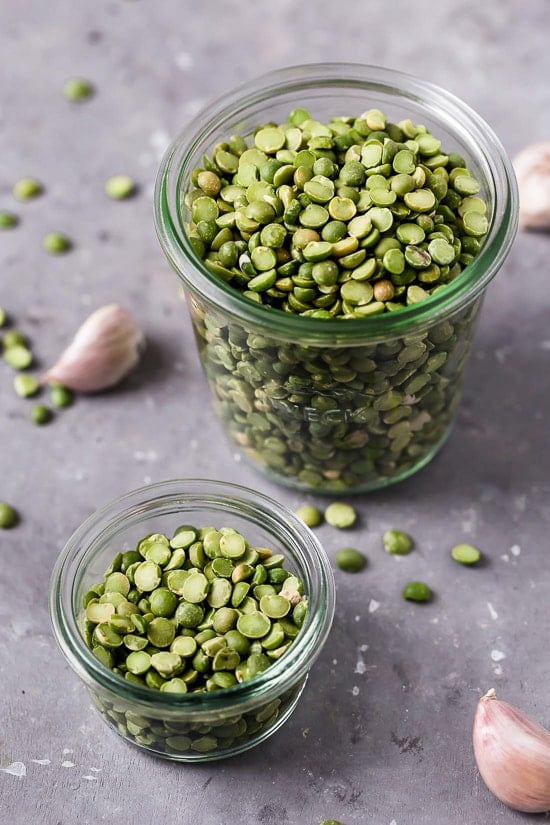This easy split pea soup with ham is what I crave on cold nights! It's a comforting recipe made with just 6 ingredients not counting salt. A jar filled with green split peas.