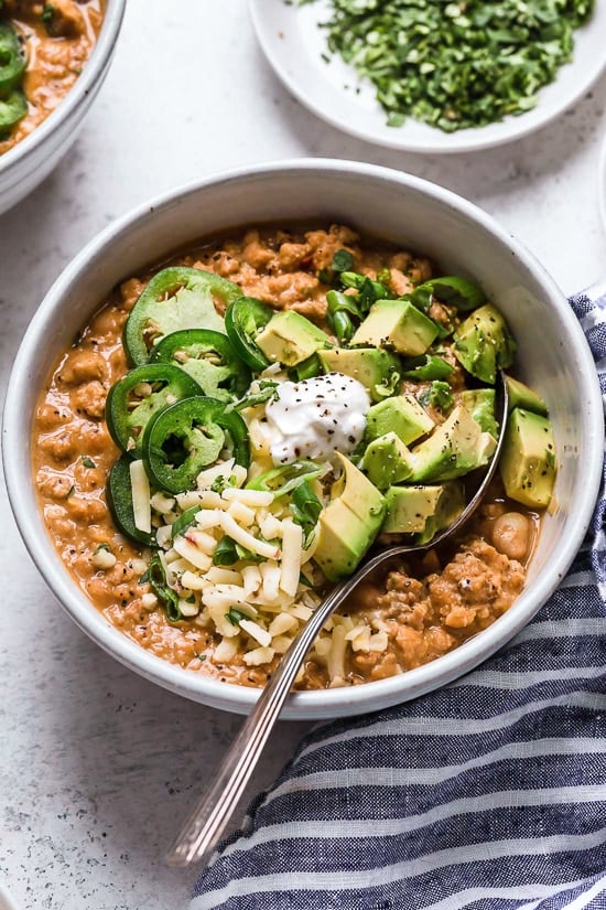 A delicious, creamy White Bean Turkey Chili recipe made with canned white beans, ground turkey, aromatics and spices – no tomatoes!