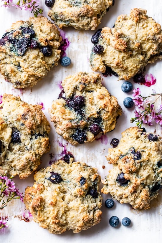 Blueberry scones on a baking sheet.