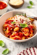 Pasta in bowl with filetto di pomodoro.