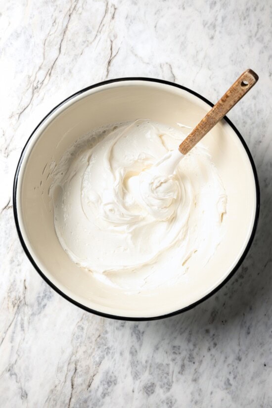 This easy banana cream pie recipe is creamy, fluffy, and full of fresh banana flavor. It’s a lighter take on a classic dessert! Filling for banana cream pie in mixing bowl.
