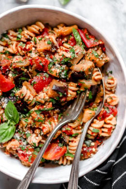 This simple Eggplant and Tomato Sauce is delicious, made with diced eggplant stewed in tomatoes and garlic. I love it served over pasta but it's also great as a side dish on it's own.