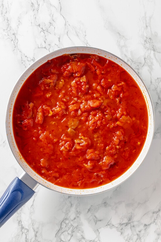 Penne alla Vodka is a simple yet showstopping pasta dish. The creamy tomato vodka sauce comes together in less than 30 minutes. Crushed and canned tomatoes in a pan