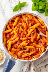 Overhead view of a dish of penne with vodka sauce
