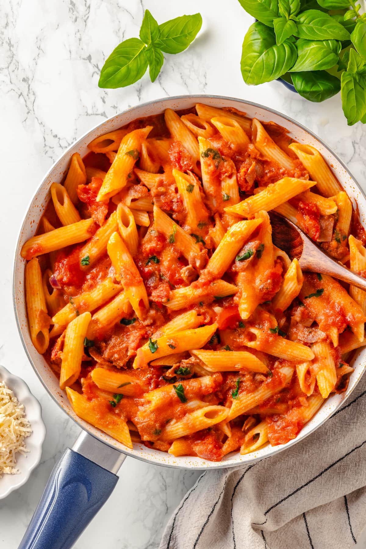 Penne alla Vodka is a simple yet showstopping pasta dish. The creamy tomato vodka sauce comes together in less than 30 minutes. Overhead view of a dish of penne with vodka sauce