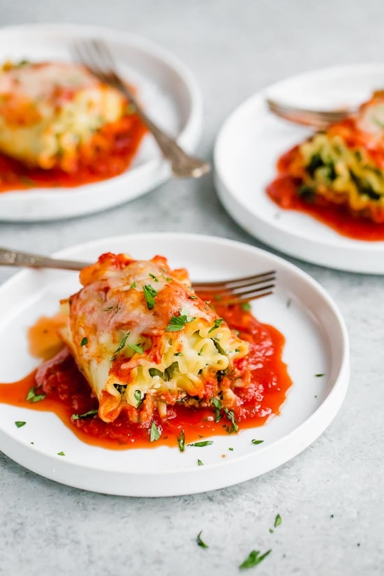 These EASY Spinach Lasagna Roll ups are totally delicious, perfect for entertaining or serving for weeknight meals.