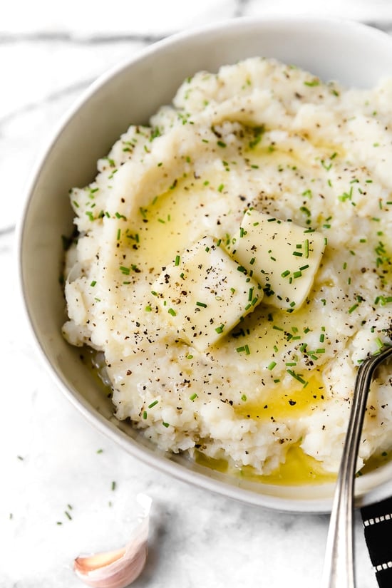 Mashed Cauliflower is essentially a creamy cauliflower puree that makes a delicious low-carb or keto alternative to mashed potatoes.
