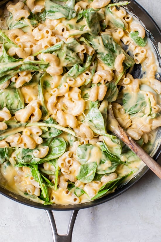 Add the cooked macaroni and spinach.