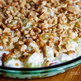 Warning! This dessert is highly addictive and hard to stop eating! Don't be fooled by the humble ingredients, this is easy to make, very refreshing, and is perfect to bring to a BBQ. Truthfully, the first time I heard of this grape dessert, the ingredients did not appeal to me. But when I tasted it, OMG! This is one of those recipes you'll be making again and again and chances are you probably have all the ingredients in your kitchen. Easily doubles for more people.