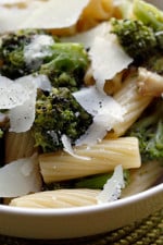 This easy and quick pasta dish is a guaranteed way to get picky eaters to love their broccoli, just roast it with garlic and olive oil!