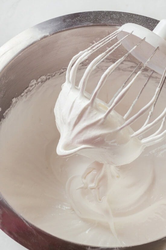 Pavlova is an elegant, light dessert that pairs airy meringue nests with whipped cream and fresh fruit. It's almost too pretty to eat! Whisk attachment whipping egg whites