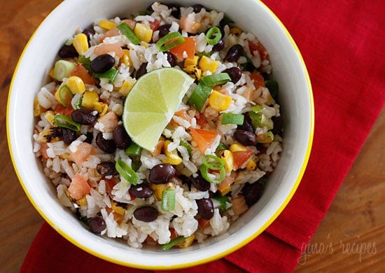 Rice, black beans, tomatoes, scallions, cilantro and lime juice, every bite of this colorful side dish will feel like one big fiesta in your mouth! Use leftover rice and this side dish comes together in minutes.