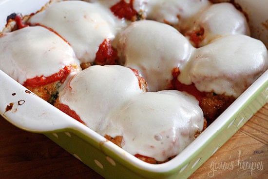 Chicken Rollatini with Spinach alla Parmigiana is Italian comfort food at it's finest! Made with breaded chicken breasts filled and rolled with spinach and cheese topped with sauce and melted mozzarella.