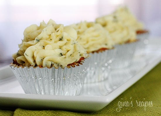 What can be cuter than mini turkey meatloaf cupcakes topped with skinny mashed potato "frosting". A family friendly meal everyone will love (and no one will guess there are vegetables hiding in the meatloaf)!