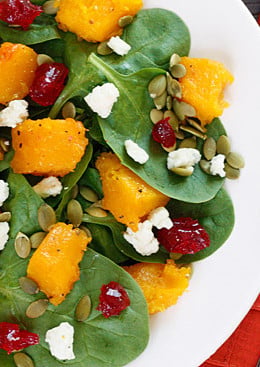The sweet-salty combination of the roasted butternut squash, dried cherries and gorgonzola cheese along with the slight crunch of the pumpkin seeds topped with a honey dijon vinaigrette will have you savoring every bite of this spinach salad!