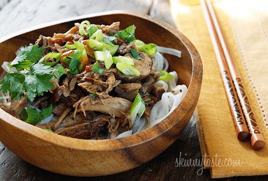 Boneless pork roast slow cooked in Asian spices creates a aromatic pork dish with mushrooms and broth, perfect over noodles or rice with fresh chopped green onions, cilantro and sriracha.
