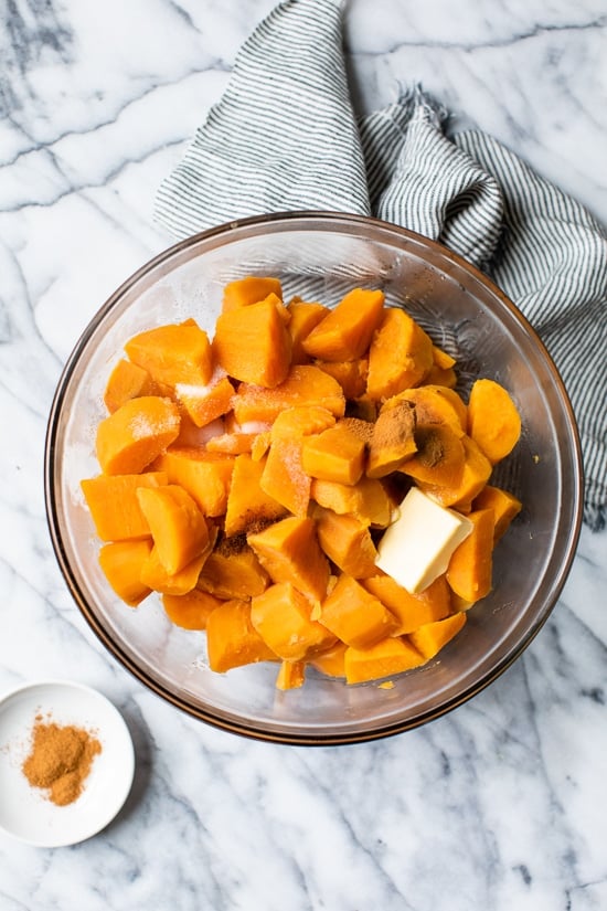 Mashed Sweet Potatoes Brulee are seasoned with with a hint of cinnamon and nutmeg topped with a caramelized brown sugar crust.