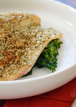 Tilapia filets topped with crushed pumpkin seeds, panko and seasonings, then baked until golden. This is super easy to make and is ready in less than 30 minutes.