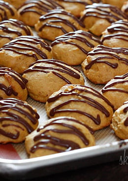 Low-fat pumpkin spice cookies have a cake ball quality to them, drizzled with a chocolate glaze, they are seriously good!