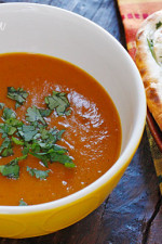 Coconut milk, cumin, garam masala, curry powder and cilantro balance the sweetness of the roasted red kuri squash, creating this aromatic Indian inspired soup. Serve this with a piece of garlic naan and you have yourself a meal.