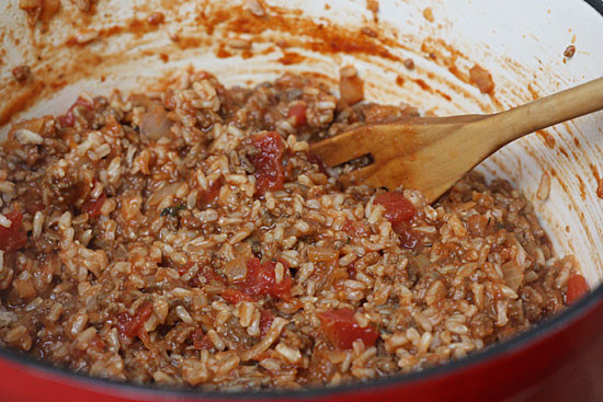 Add rice to the meat