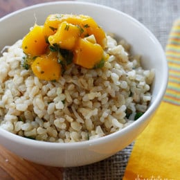 Coconut milk, brown rice, coconut flakes, fresh ginger and cilantro are combined to create this simple side dish, perfect to accompany many Thai dishes.