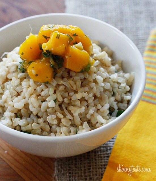 Coconut milk, brown rice, coconut flakes, fresh ginger and cilantro are combined to create this simple side dish, perfect to accompany many Thai dishes.