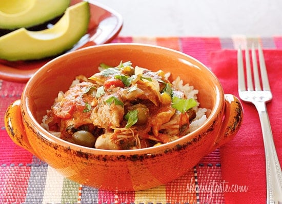 Chicken a la Criolla, a simple yet flavorful Latin dish made with stewed boneless skinless chicken thighs bell peppers, onions, garlic, tomatoes, olives, cilantro and spices.
