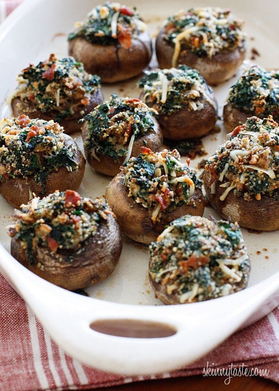Skinny Spinach and Bacon Stuffed Mushrooms Spinach and Bacon Stuffed Mushrooms stuffed with sautéed baby spinach, chopped mushrooms, bacon, bread crumbs and Parmesan cheese – a lighter alternative to traditional stuffed mushrooms yet loaded with tons of flavor!