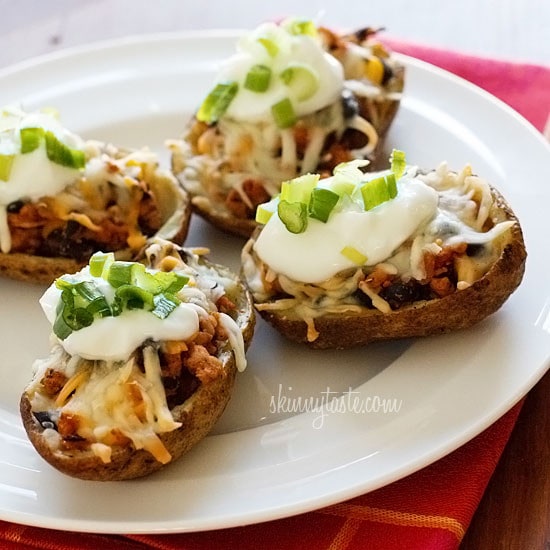 Skinny potato skins loaded Santa Fe style with mildly spiced turkey, black beans, corn and tomatoes topped with cheese - you won't be able to stop at just one!