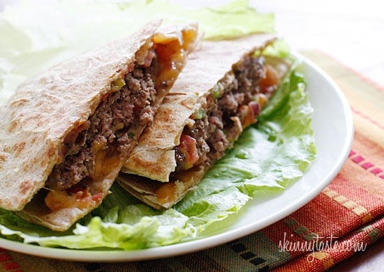 100% grass-fed buffalo burgers with melted cheddar jack cheese and pico de gallo wedged in between two whole wheat tortillas.