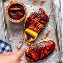 Homemade sweet and spicy Kansas City style BBQ sauce made with tomato sauce, honey, molasses, vinegar and spices.