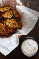 Cornmeal panko herb crusted dill pickles baked in the oven until golden and crisp with a light buttermilk ranch dip. Have you ever had fried pickles?