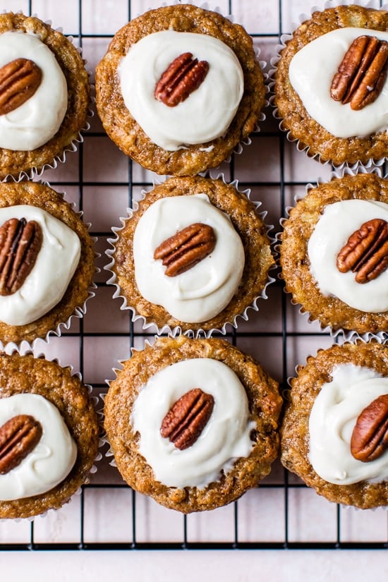 These super moist hummingbird cupcakes are light, full of pineapple, chopped bananas, pecans, cinnamon and spices topped off with a sweet cream cheese frosting.