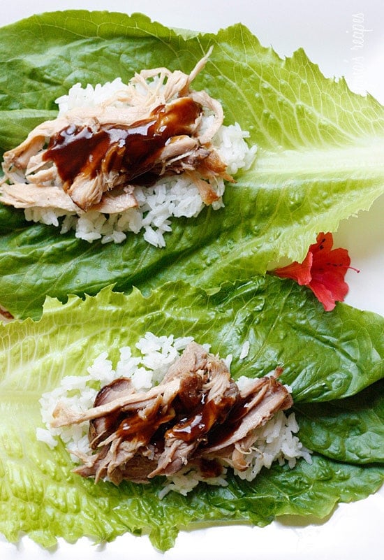 This EASY 3-ingredient slow cooker kalua pork dish has become a staple in my house! We make it at least once a month because it's SO easy and it makes enough for several meals!