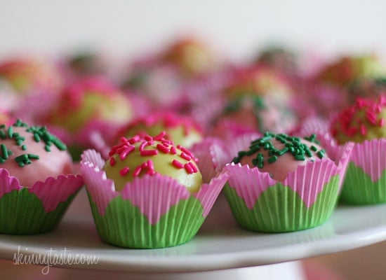These Skinny Cake pops are made lighter by using a box cake mix, egg whites and fat free Greek yogurt – no oil, no butter required!