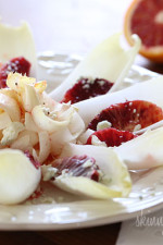 A simple salad made with endive lettuce, blood oranges, Gorgonzola with a blood orange vinaigrette.