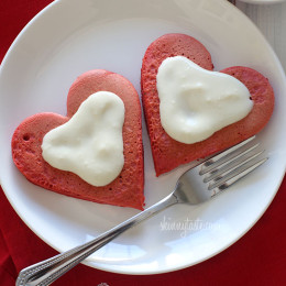 These lightened-up red velvet pancakes are made with a blend of white whole wheat flour and all purpose, then topped with a light cream cheese topping. I adore red velvet, so I can't think of a more fitting time to make red velvet pancakes, then for Valentine's Day!