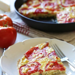 Garden tomatoes, summer zucchini, and Asiago cheese make a scrumptious frittata that highlights the end of summer's bounty.
