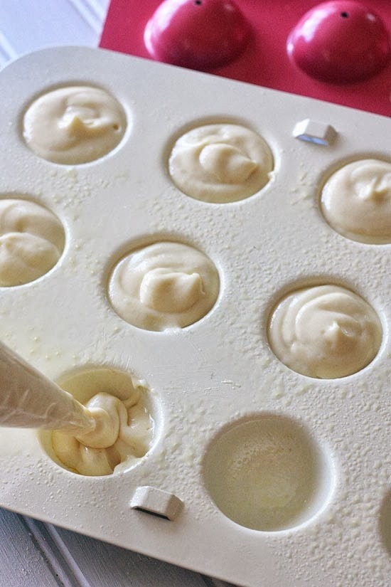 Easy Skinny Halloween mummy cake balls made light by using a box cake mix, egg whites and fat free Greek yogurt – no butter required!