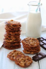 These delicious dark chocolate oatmeal lace cookies are light, crisp and chewy, sandwiched together with melted dark chocolate.