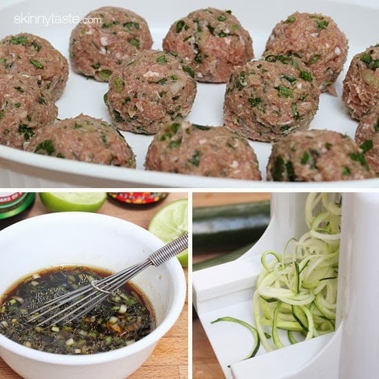 Uncooked turkey meatballs on a tray, zoodles being spiralized and a bowl of sesame lime dipping sauce with a whisk.
