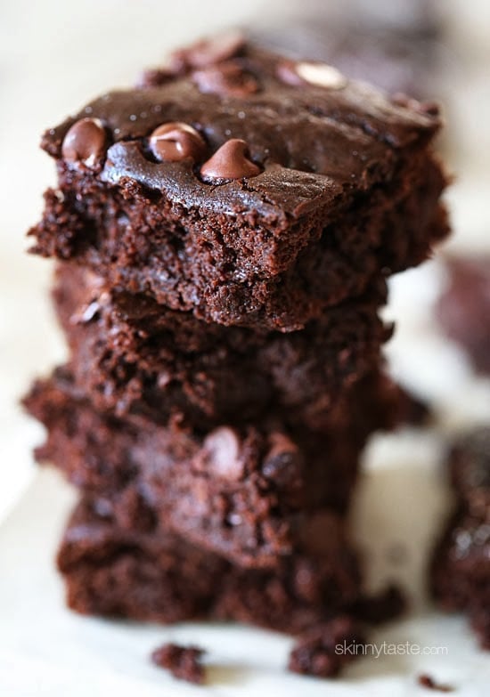 Stack of fudgy black bean brownies with chocolate chips