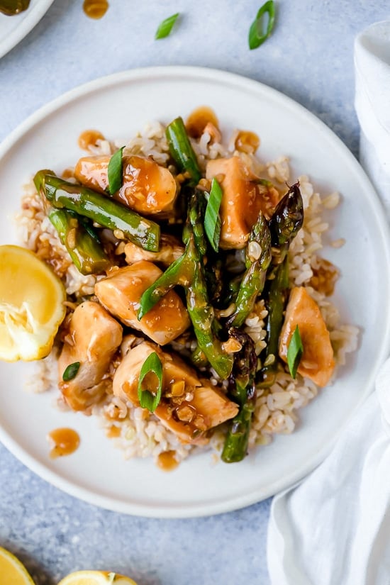 This quick weeknight Chicken and Asparagus Lemon Stir Fry is perfect for spring, made with lean chicken breast, asparagus, fresh lemon, garlic and ginger.