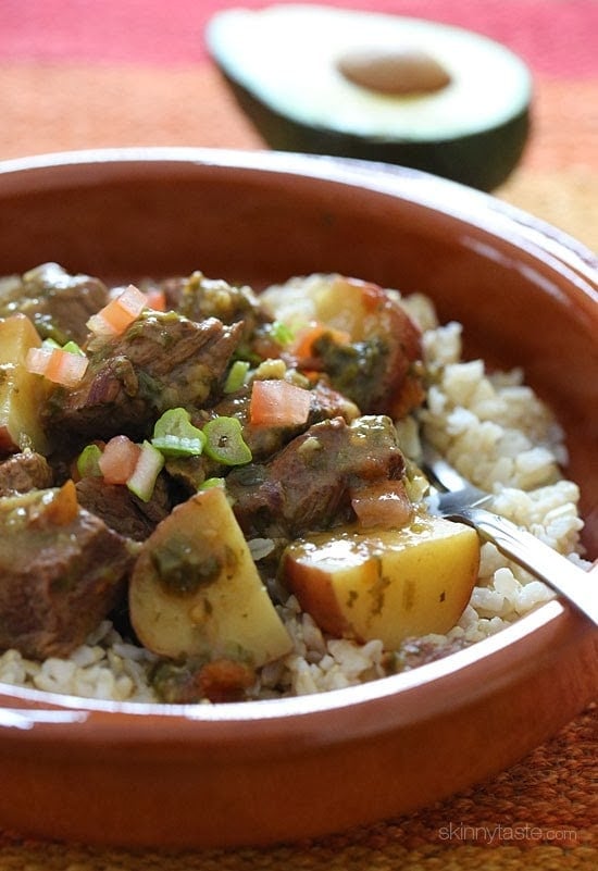 Crock pot carne guisada is a slow cooked Latin beef stew with baby red potatoes and Latin seasonings. Serve this topped with fresh aji picante – it's a must and really brightens the flavors and rounds out the dish!
