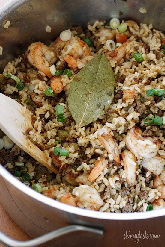 Want to know how to cook perfect brown rice? This easy, foolproof brown rice recipe will give you perfect rice that is never sticky. An bowl filled with dirty brown rice.