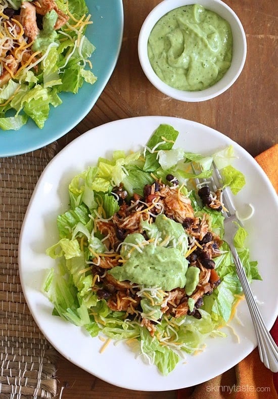 Easy Crock Pot Chicken and Black Bean Taco Salad This simple slow cooker chicken taco salad is high in fiber and protein which means it's very satisfying – all for under 300 calories. Trust me, you won't miss the tortillas!