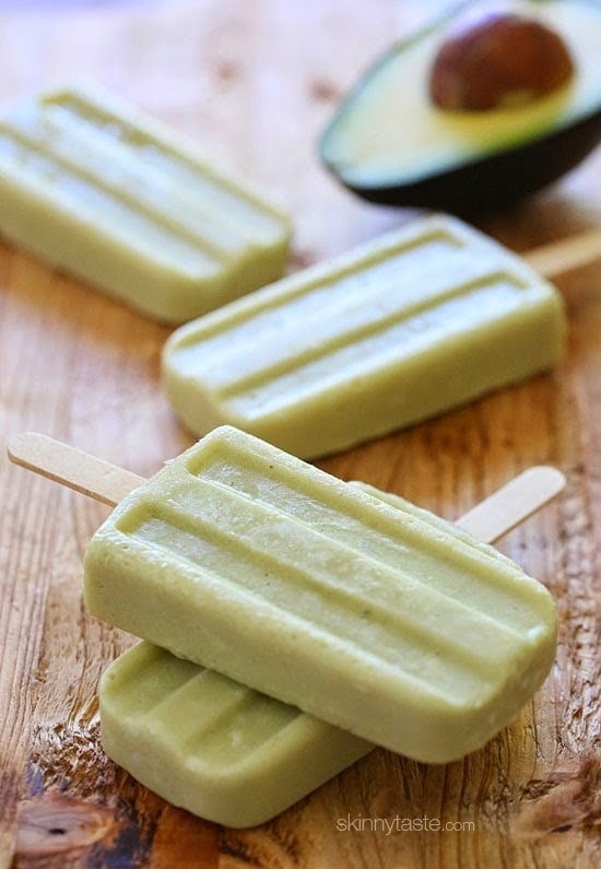 These creamy avocado coconut popsicles are made with just 4 ingredients – nutrient dense avocados, coconut-almond milk, raw sugar and coconut flakes.