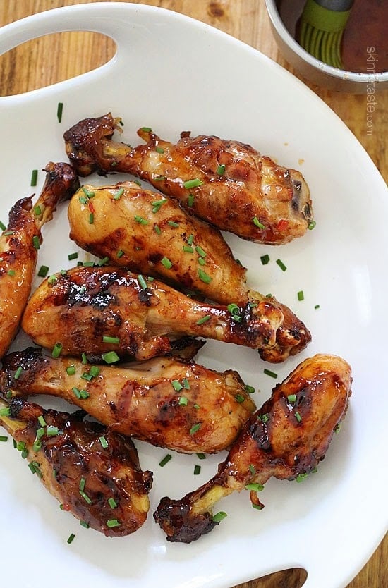 Sweet 'n Spicy Asian Glazed Grilled Drumsticks These sweet 'n spicy Asian glazed grilled drumsticks are finger licking good! An inexpensive, weeknight dish you'll want to make all summer long!