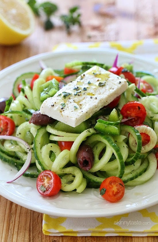 Spiralized Greek Cucumber Salad with Lemon and Feta Spiralized Greek Cucumber Salad with Lemon and Feta is delicious, the perfect light dish. In Greece, Greek salads do not have lettuce, instead they are made with fresh cucumber, tomatoes, bell pepper, olives, red onion, oregano, lemon juice, olive oil, and fresh feta – delicious!